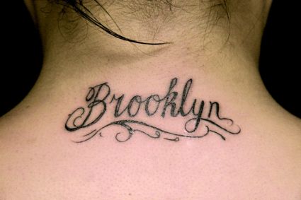 Girl's Neck Text Tattoo